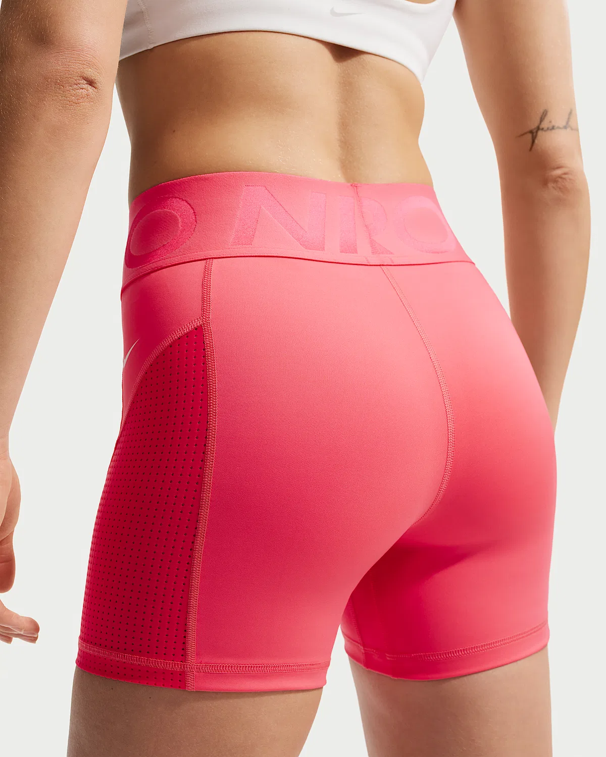 Женские шорты-велосипедки Nike Pro Sculpt Dri-FIT с высокой посадкой, 5", Sea Coral/Light Fusion Red/White — фото 3