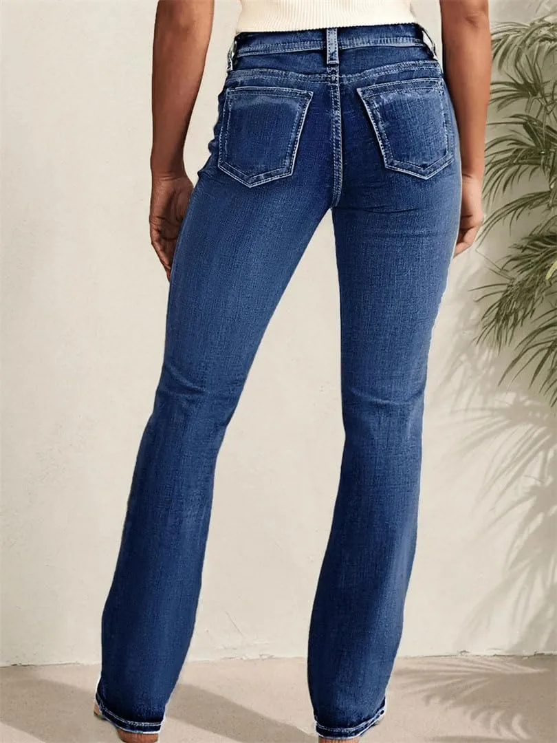 Женские джинсы slim fit с расклешенным низом, слегка потертые — фото 4