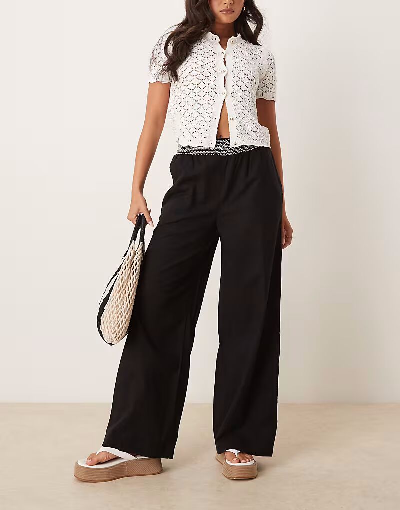 

Широкие брюки ASOS DESIGN из льняной смеси с застежкой-молнией и сборкой на талии черного цвета с кремовым оттенком