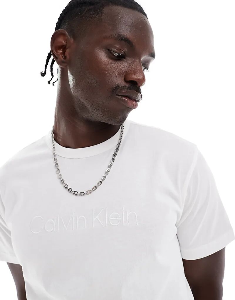 

Хлопковая футболка белого цвета с вышитым логотипом Calvin Klein