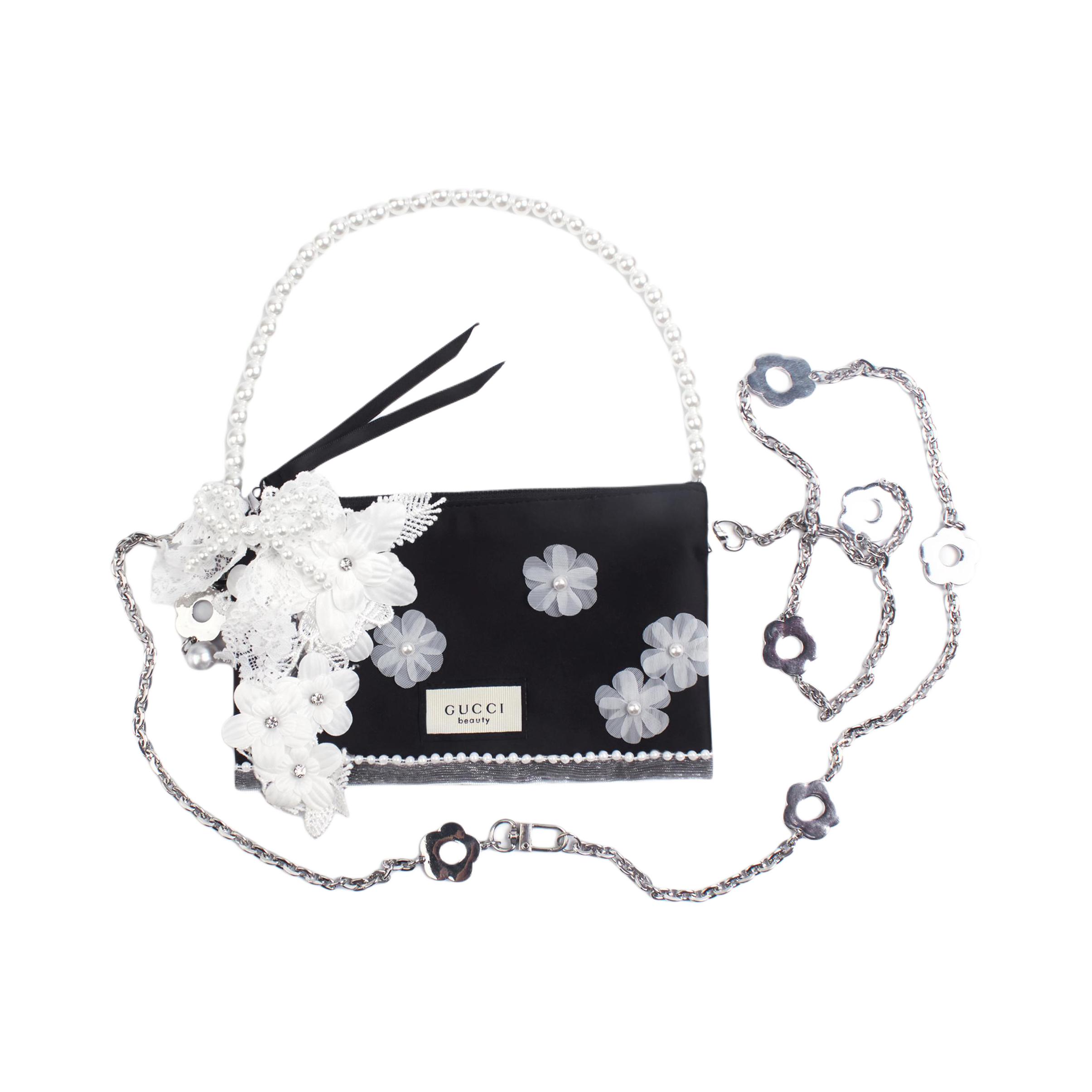 

Косметички и сумки для туалетных принадлежностей унисекс GUCCI