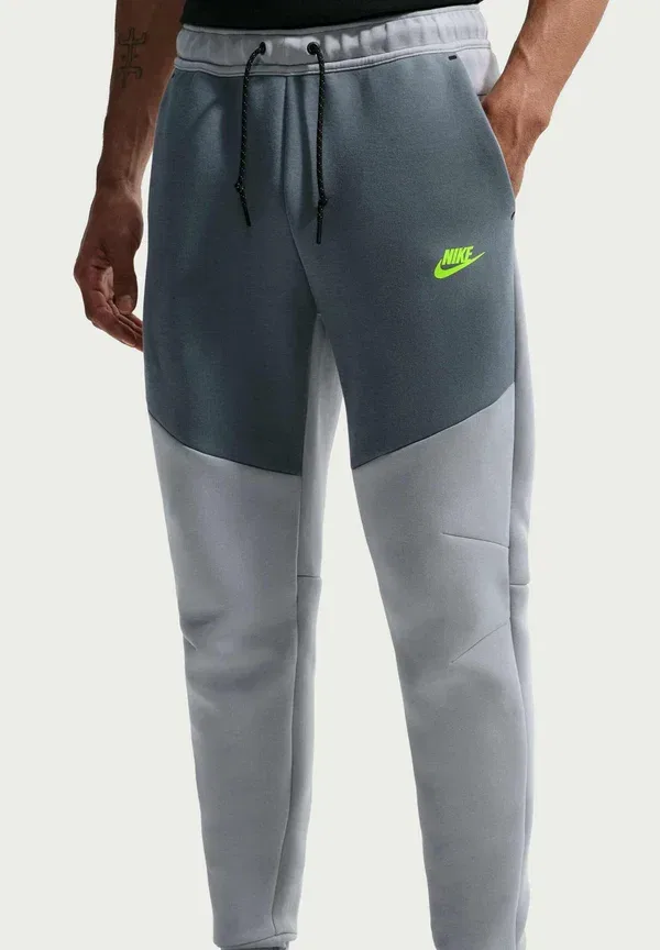 Спортивные штаны Nike Sportswear M nk tch flc jggr tracksuit bottoms, светло-серебристый черный — фото 4