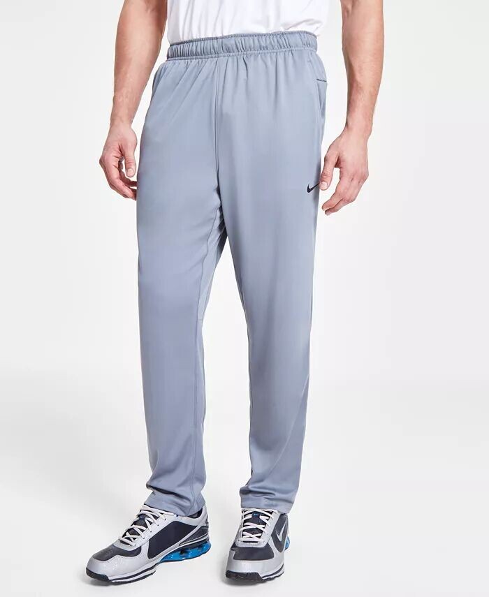 

Мужские универсальные брюки Totality Dri-FIT с открытым подолом Nike, серый