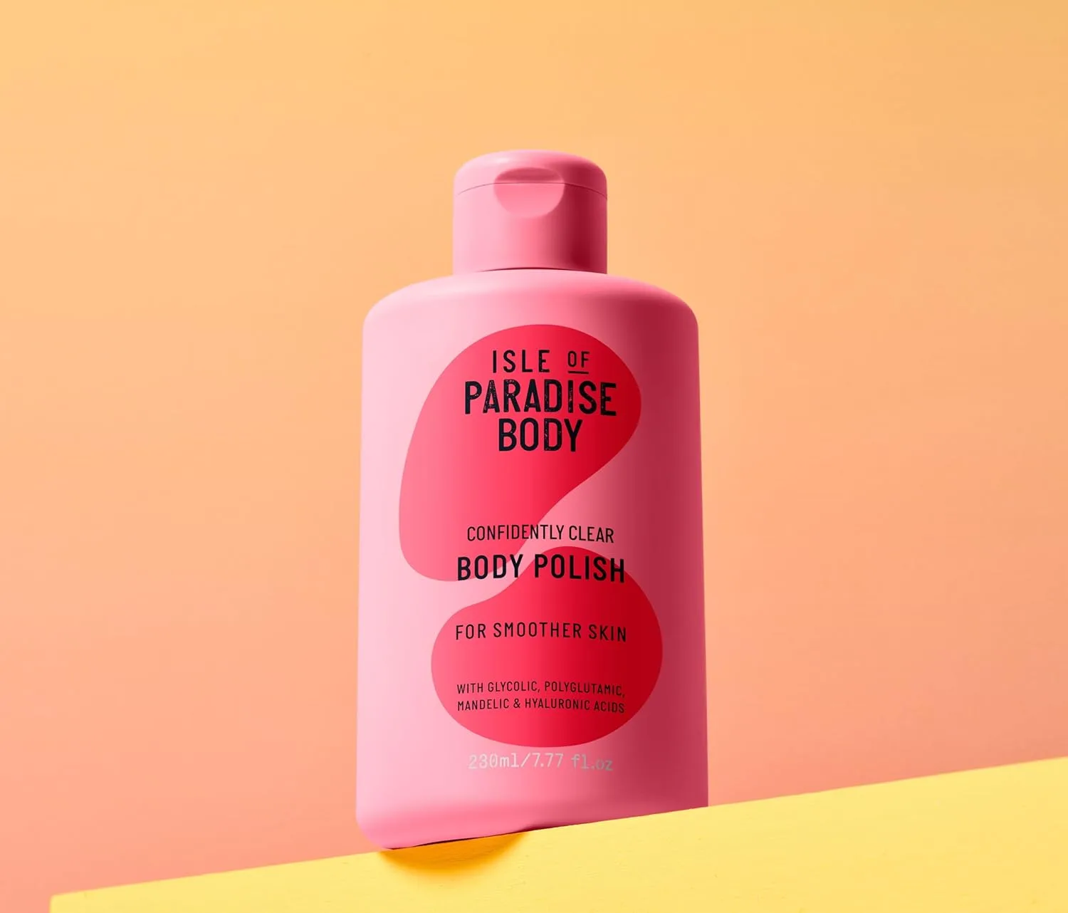 Isle of Paradise Confidently Clear Body Polish - скраб для тела с гликолевой, полиглутаминовой, миндальной и гиалуроновой кислотами, 230 мл, orange — фото 2