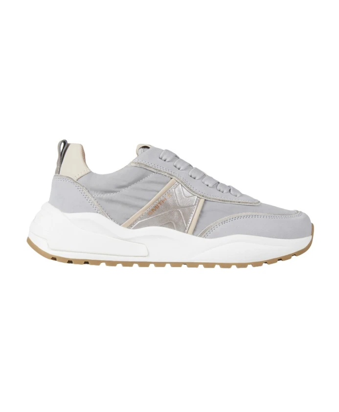 

Платье Blaze Donna выполнено из нейлона Avio с деталями из серебристого ламината. Alexander Smith, синий