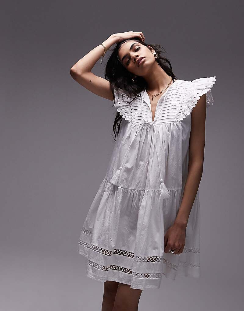 

Topshop – Белое мини-платье с английской вышивкой и бахромой