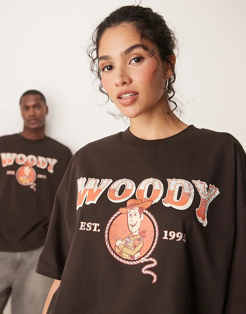 

Футболка унисекс оверсайз ASOS DESIGN Disney Pixar с принтом Вуди из «Истории игрушек» коричневого цвета