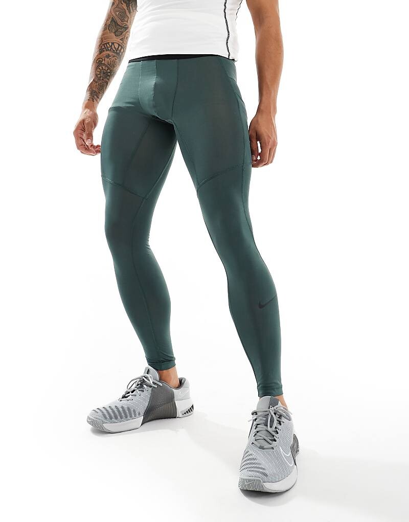 

Темно-зеленые компрессионные леггинсы Nike Training Pro