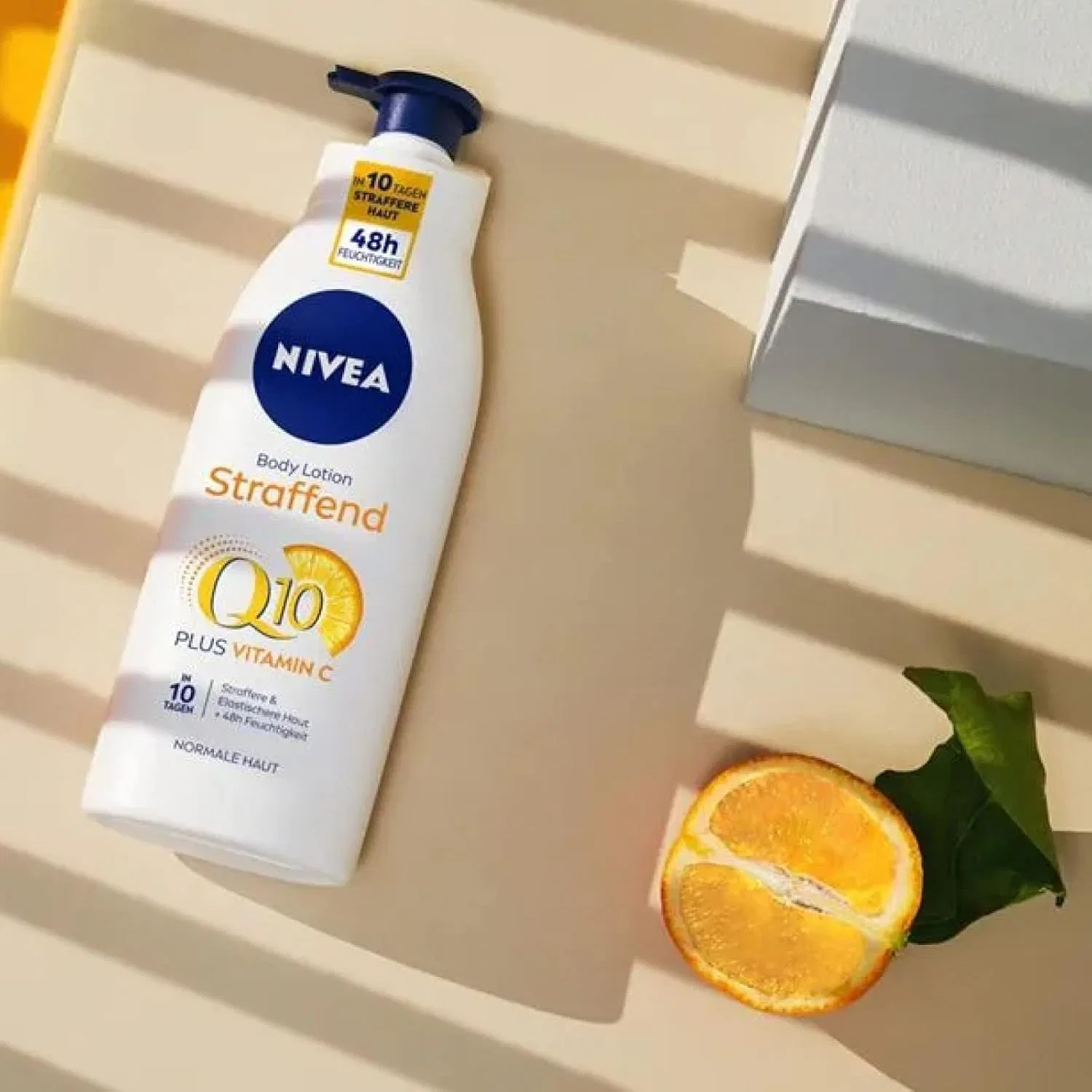 Увлажняющее молочко для тела Q10 с витамином С от Nivea, 3 бутылки по 400 мл Nivea — фото 4