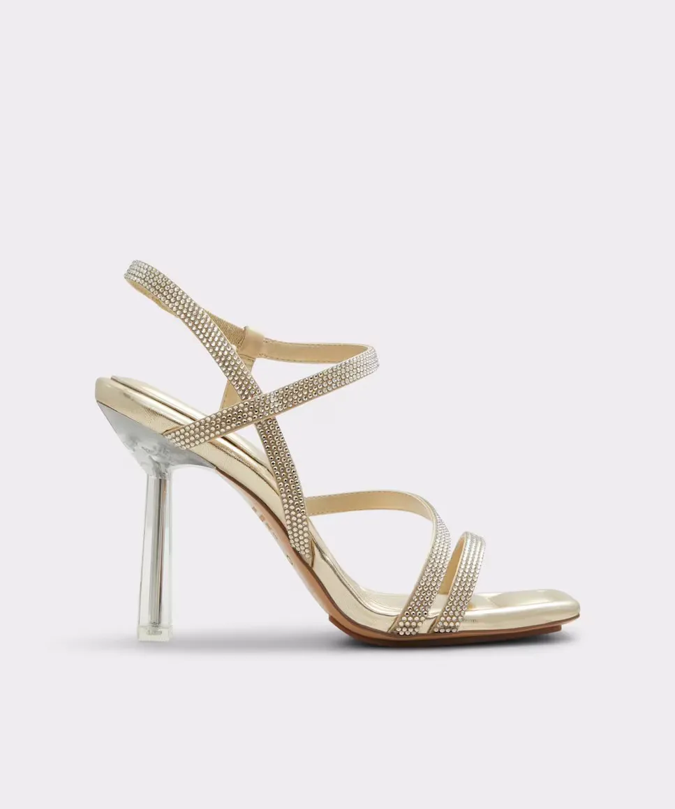 

Женские босоножки на каблуке из золотой ткани Aldo