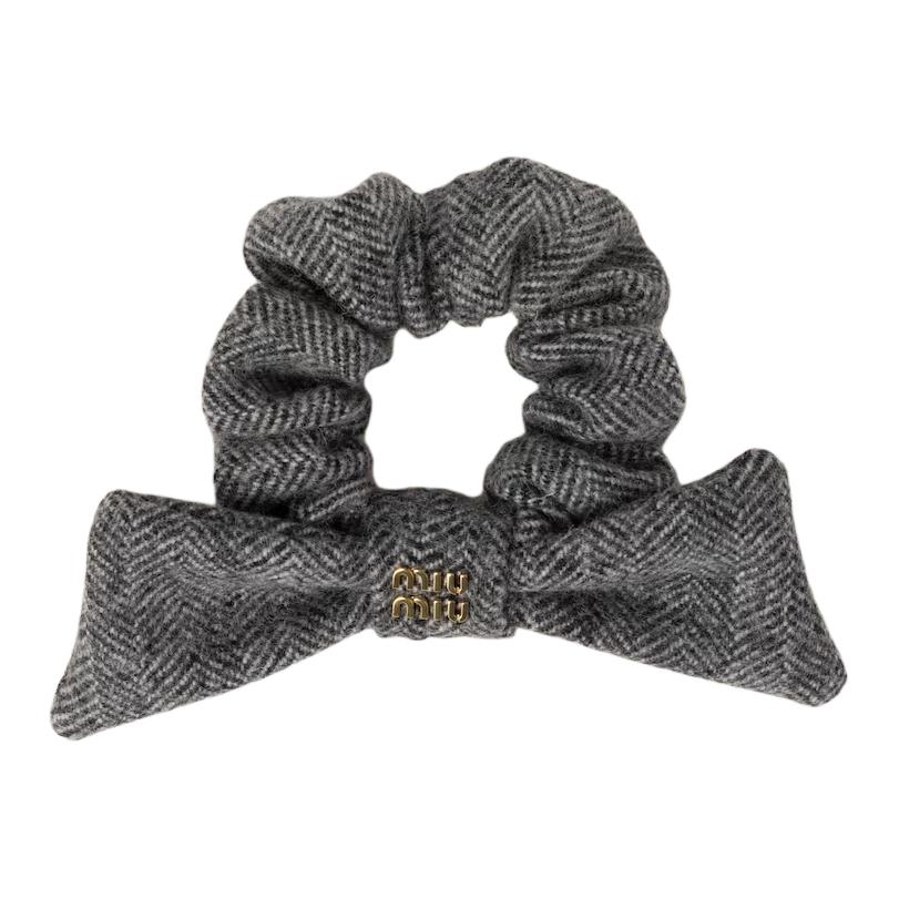 

MIU MIU Металлические резинки для волос Women's Black