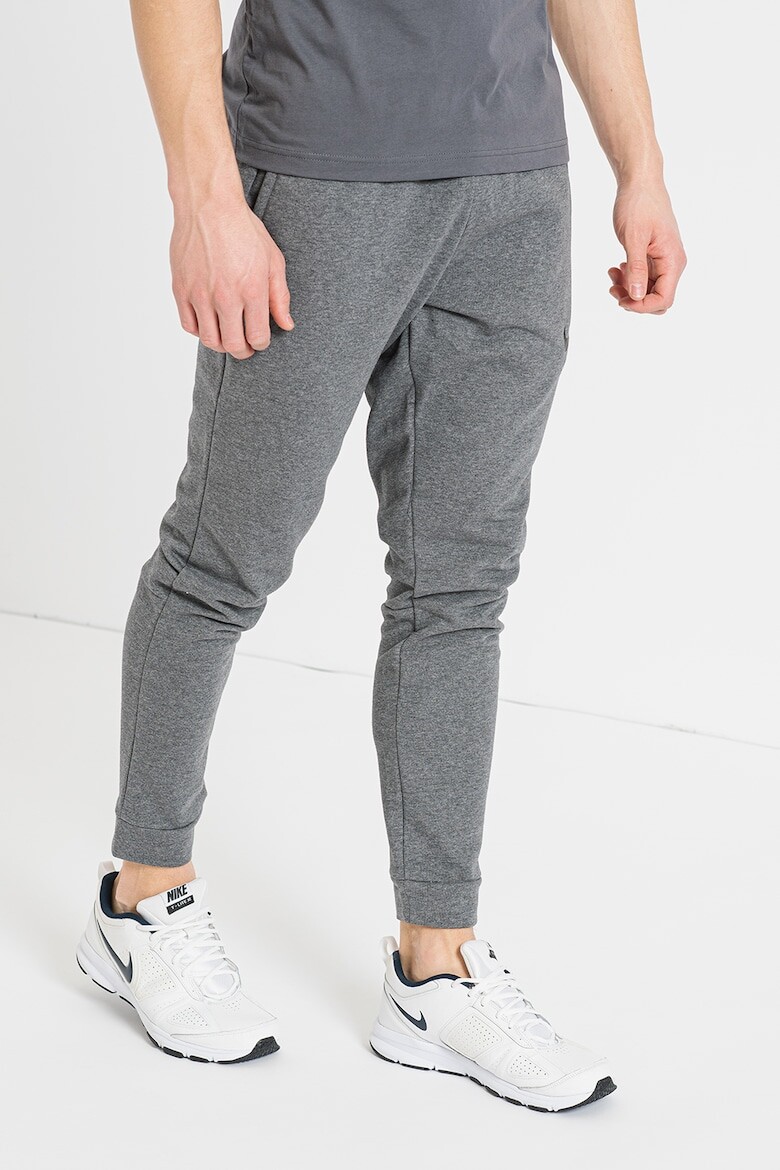 

Тренировочные брюки Dri-FIT с зауженной кромкой Nike, серый