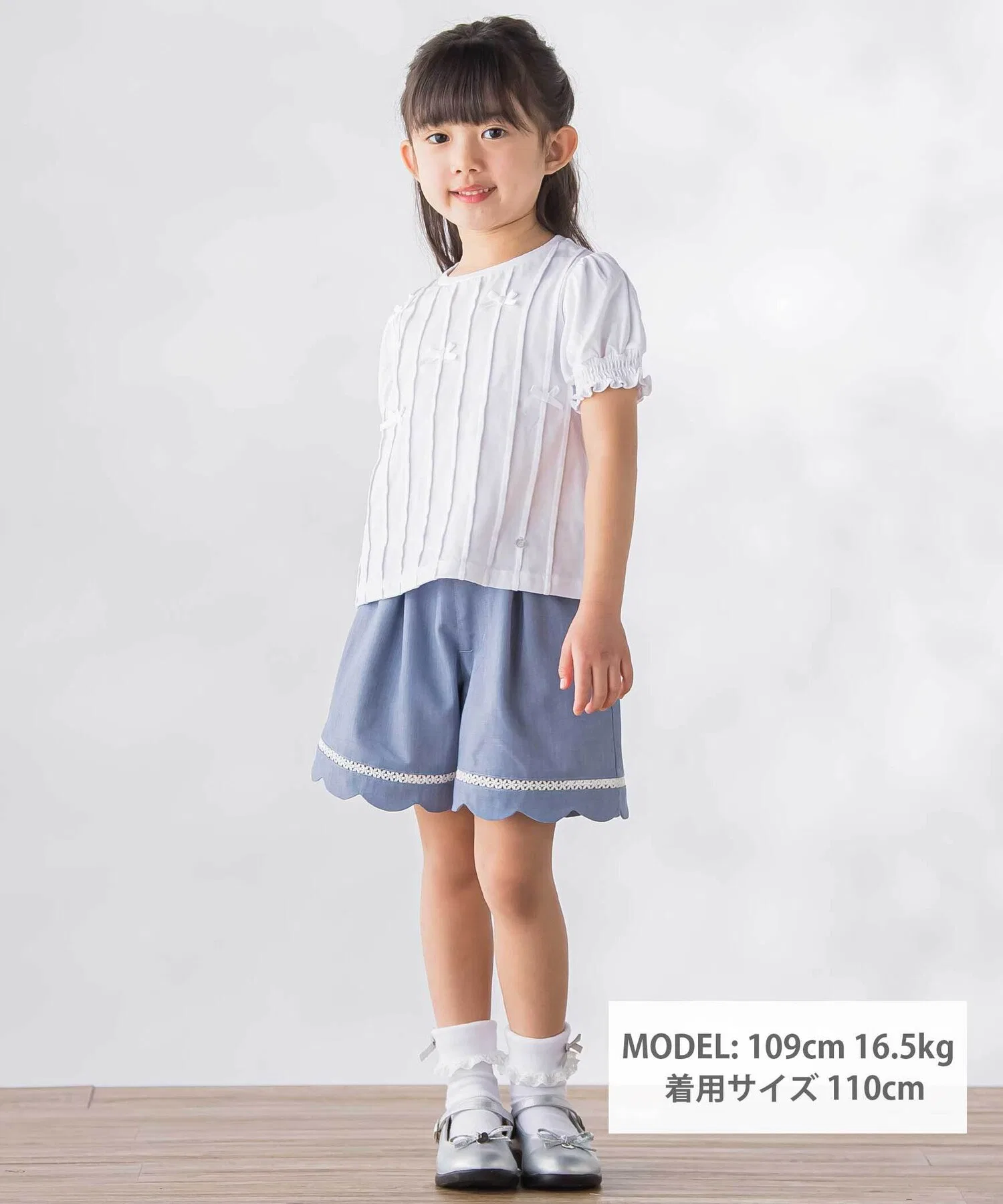 Детская футболка с бантом BeBe Petits Pois Vert чёрная — фото 2