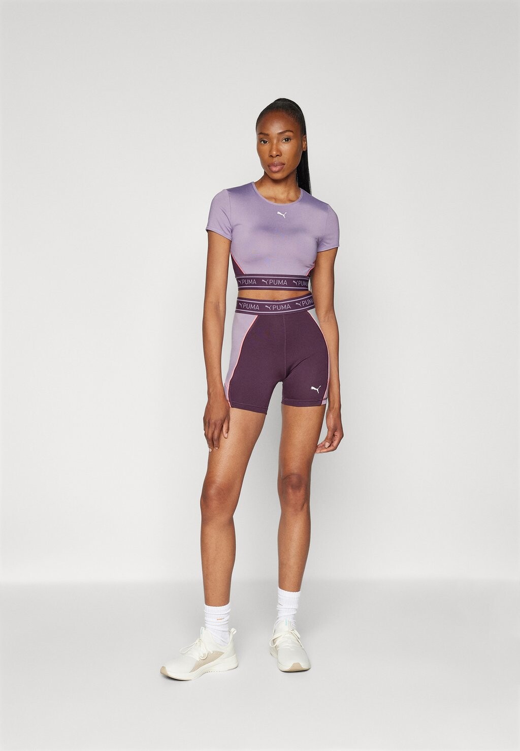 

Спортивная футболка STRONG BABY TEE SHORT Puma, сирень