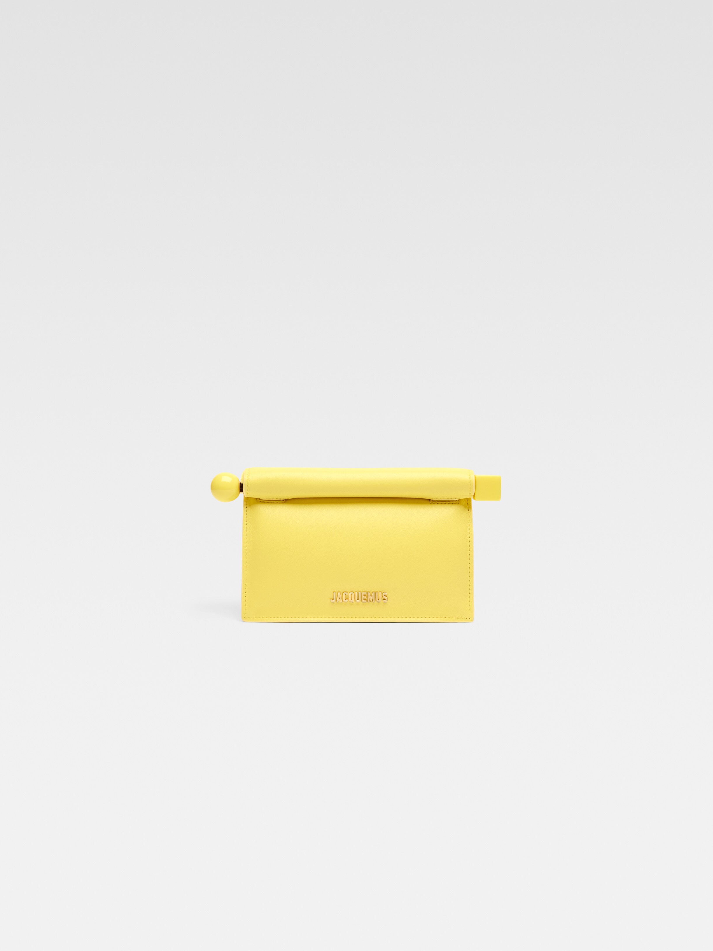 

Мини-сумка take-away JACQUEMUS The small Rond Carré clutch, желтый