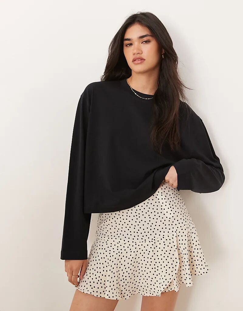 

Укороченная футболка свободного кроя с длинными рукавами ASOS DESIGN черного цвета
