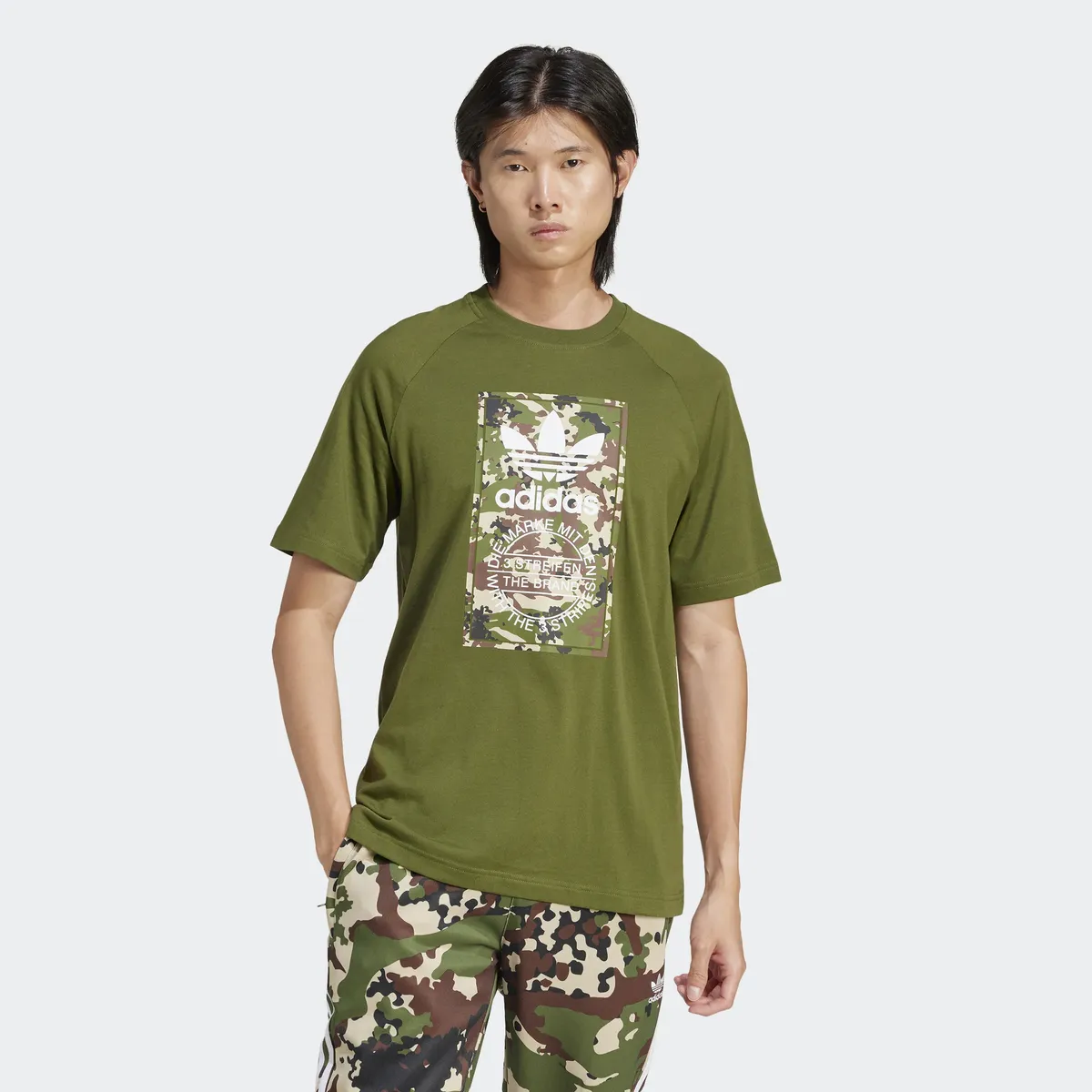 

Футболка Adidas Originals "CAMO TONGU TEE", цвет Wilpin