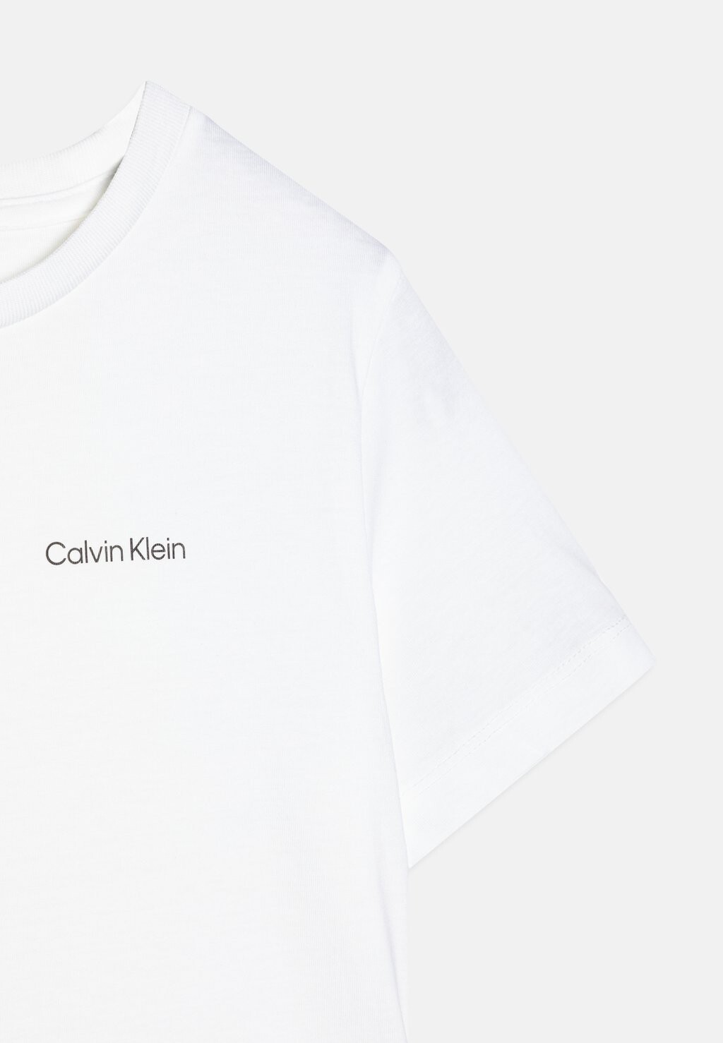 Базовая футболка CHEST LOGO UNISEX Calvin Klein Jeans, белый — фото 2