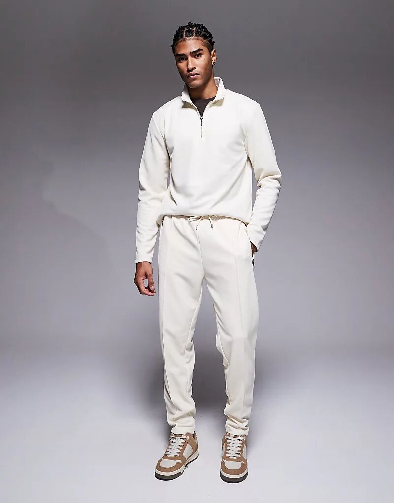 

Узкие спортивные брюки River Island из пике цвета экрю