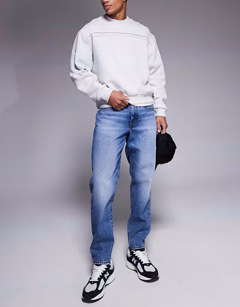 

Джинсы-карроты ASOS DESIGN темно-синего цвета с потертостями