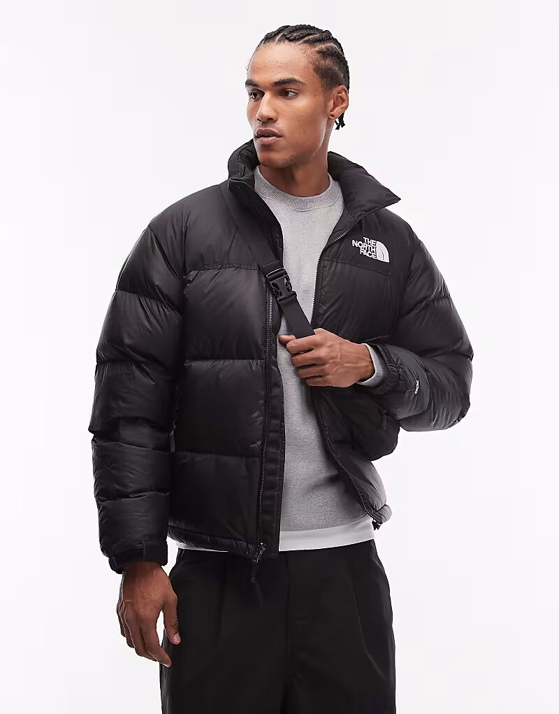

Пуховик North Face Retro Nuptse черного цвета The North Face