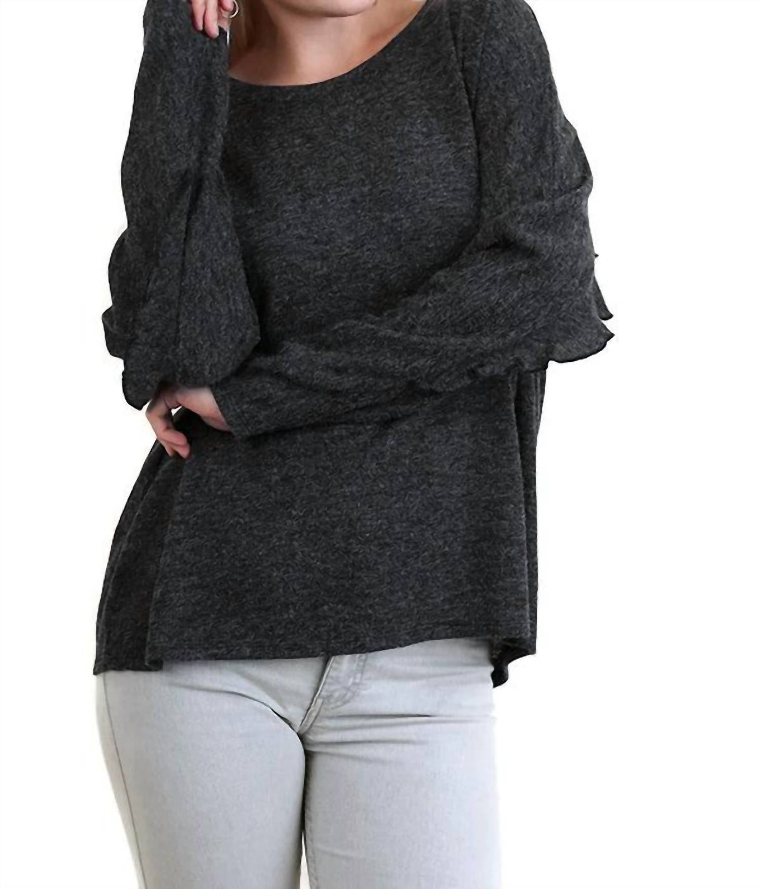 

Топ с длинными рукавами и оборками черного цвета umgee