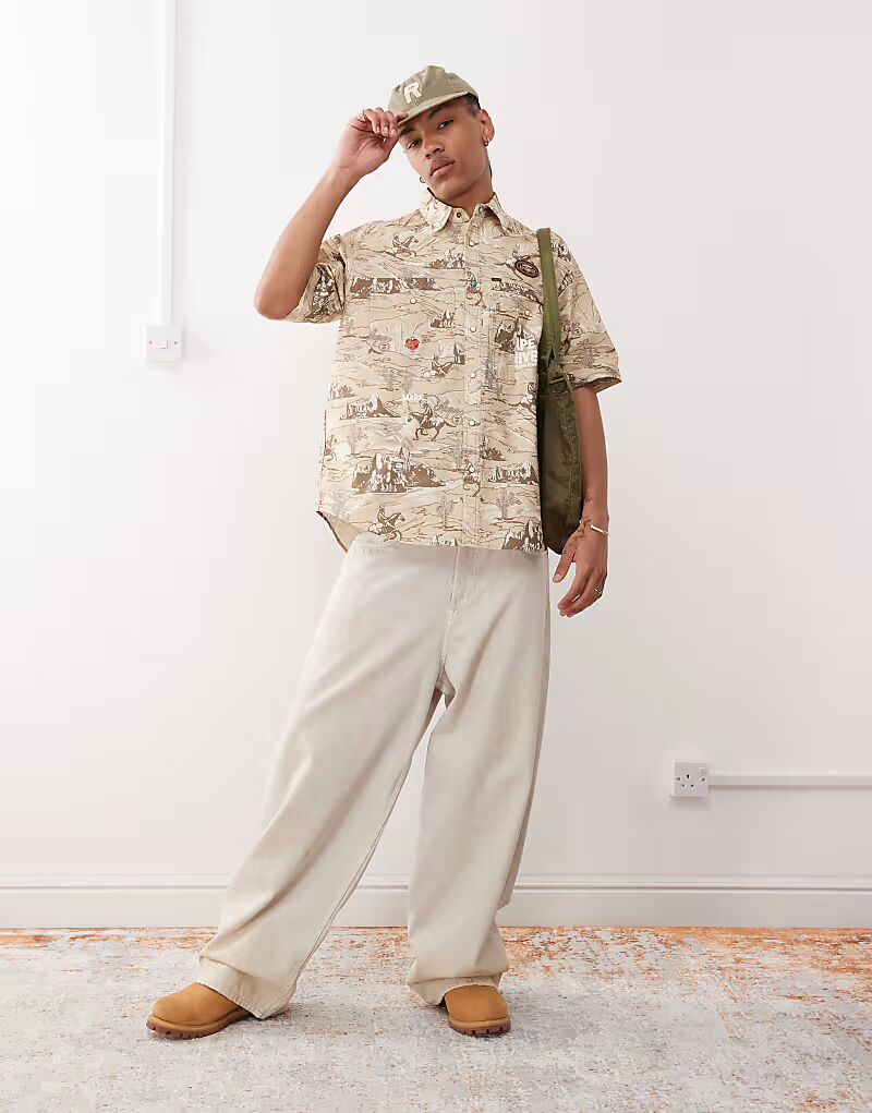 

Рубашка Aape by A Bathing Ape в комплекте с принтом «родео» бежевого цвета Aape By A Bathing Ape