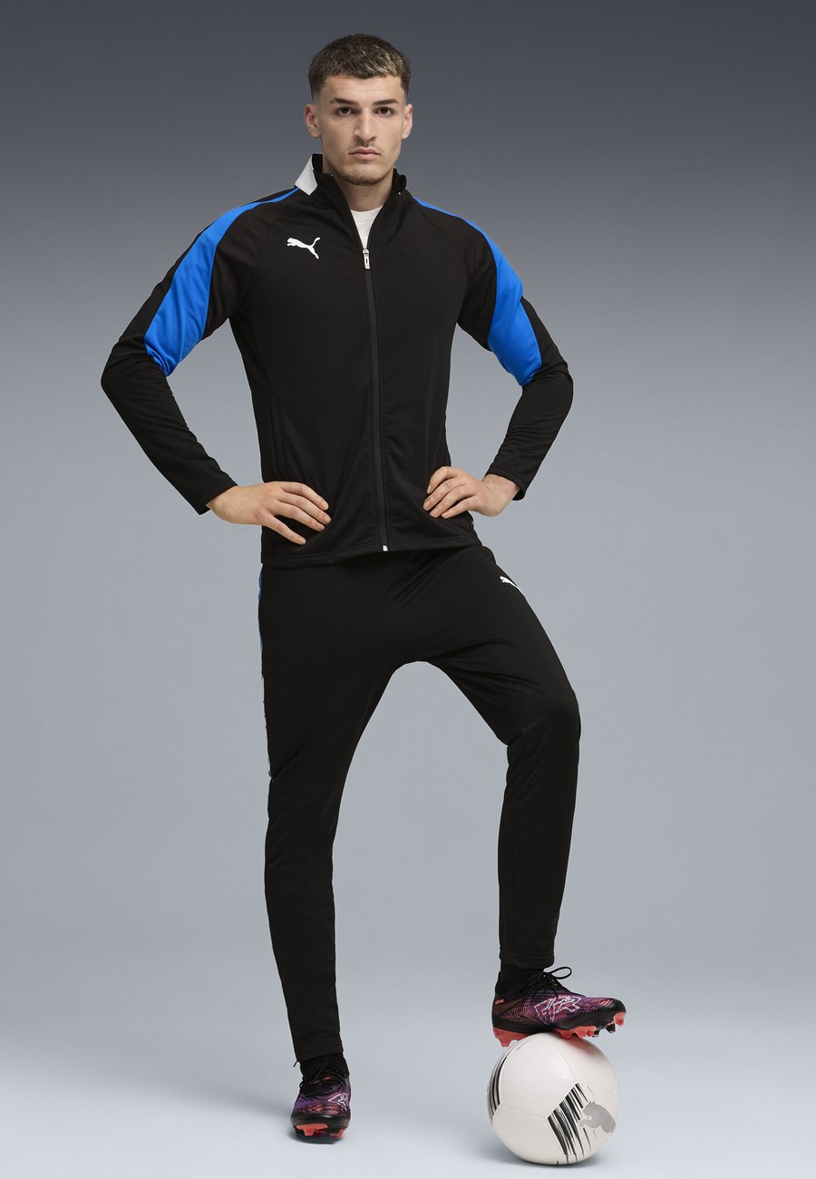 

Спортивный костюм Puma INDIVIDUALLIGA SET, Black- White-Ultra Blue/Black