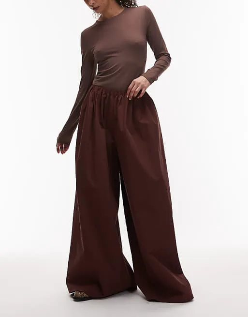 

Коричневые суперширокие брюки ASOS DESIGN