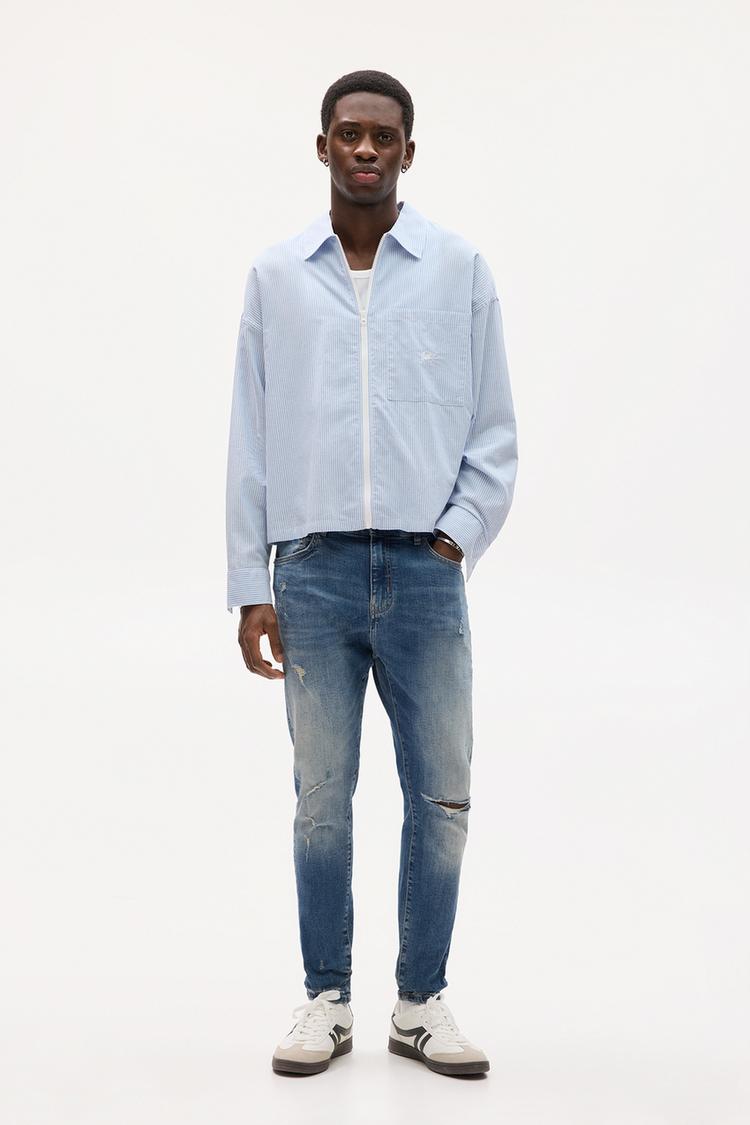 

Джинсы с рваными краями Pull And Bear, синий