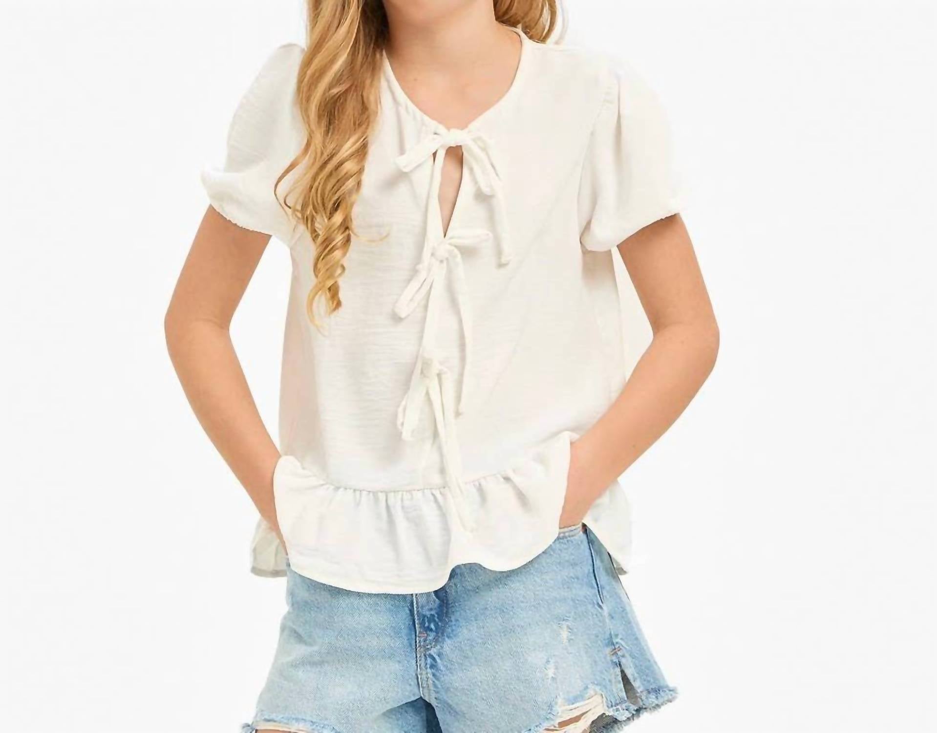 

Блузка с рюшами и завязками спереди, цвет слоновая кость Good Girl