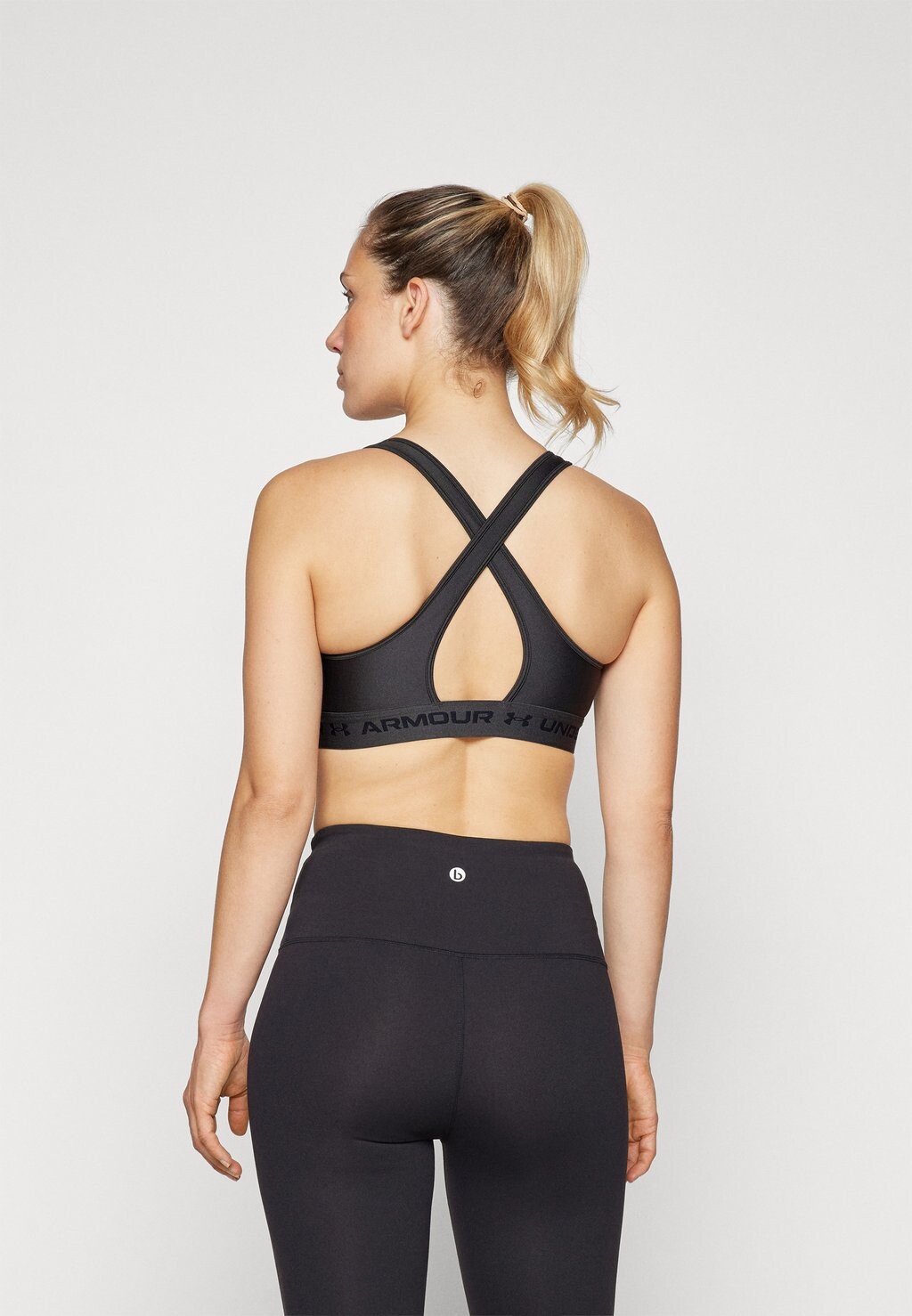 

Спортивный бюстгальтер: средняя поддержка CROSSBACK MID BRA Under Armour, серый