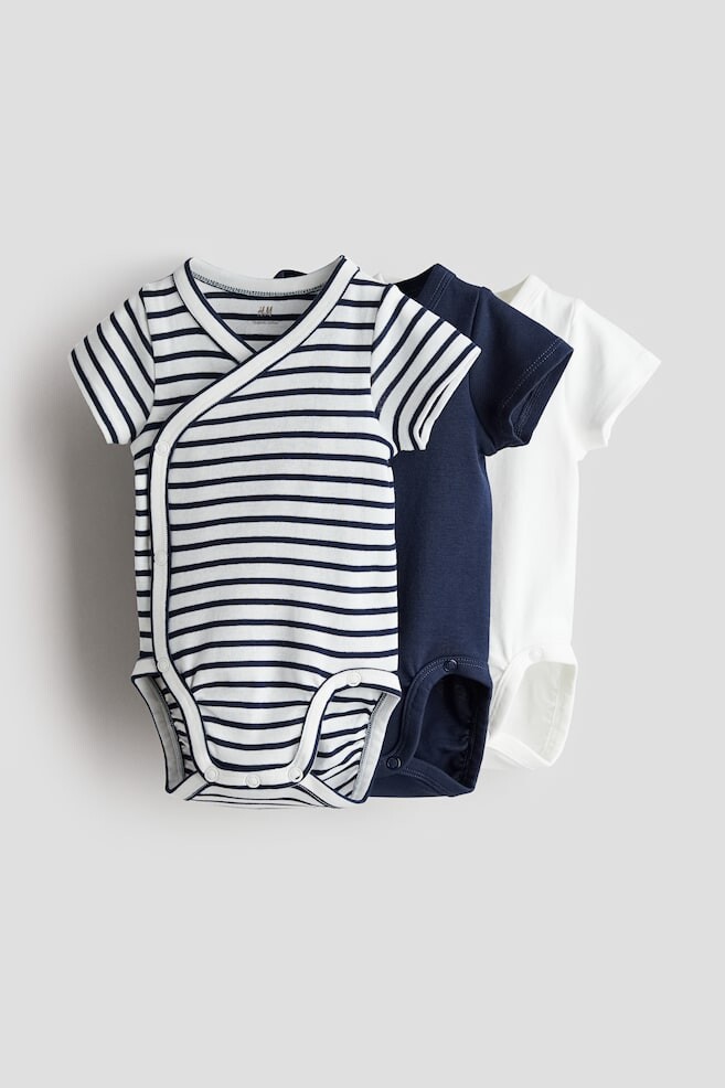 

В упаковке 3 боди с запахом H&M, синий