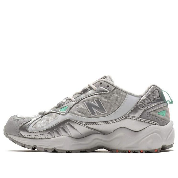 

Кроссовки 703 серии серебристо- New Balance, серый