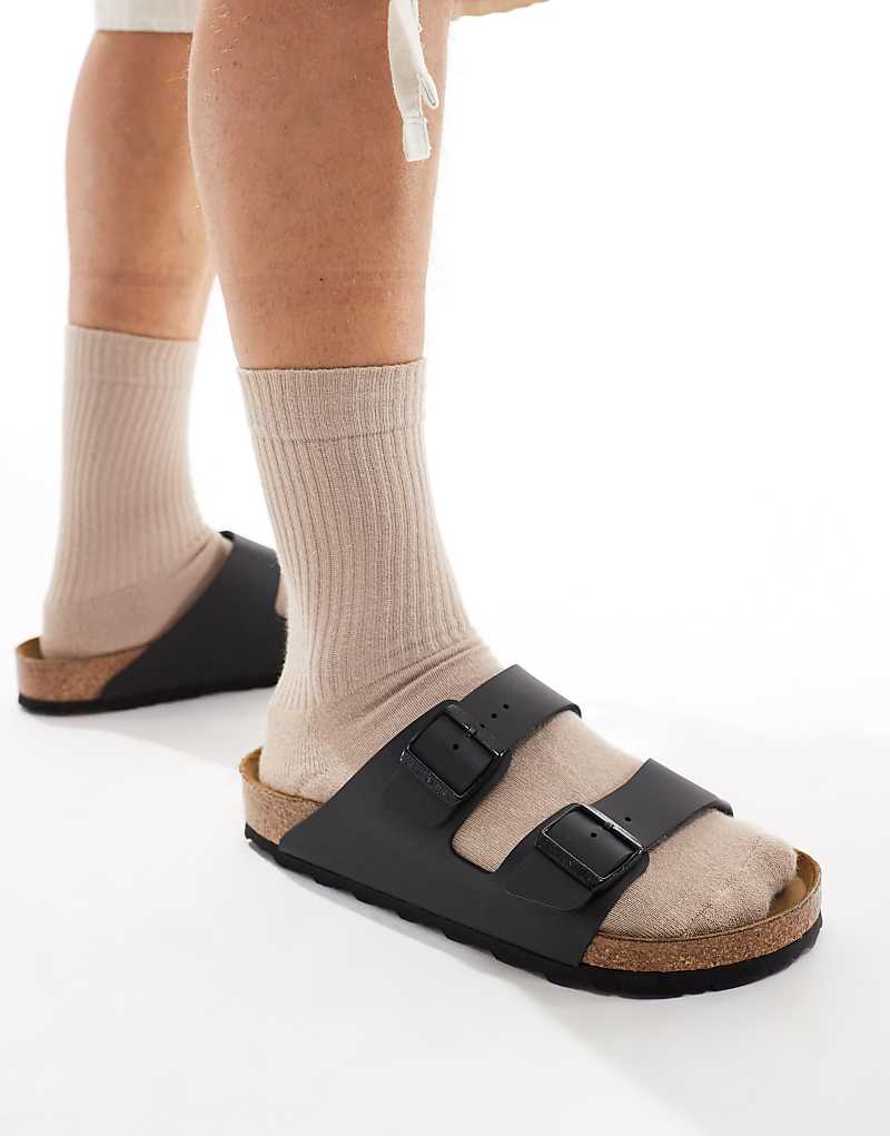 

Черные сандалии Birkenstock Arizona Birko Flor в стиле унисекс