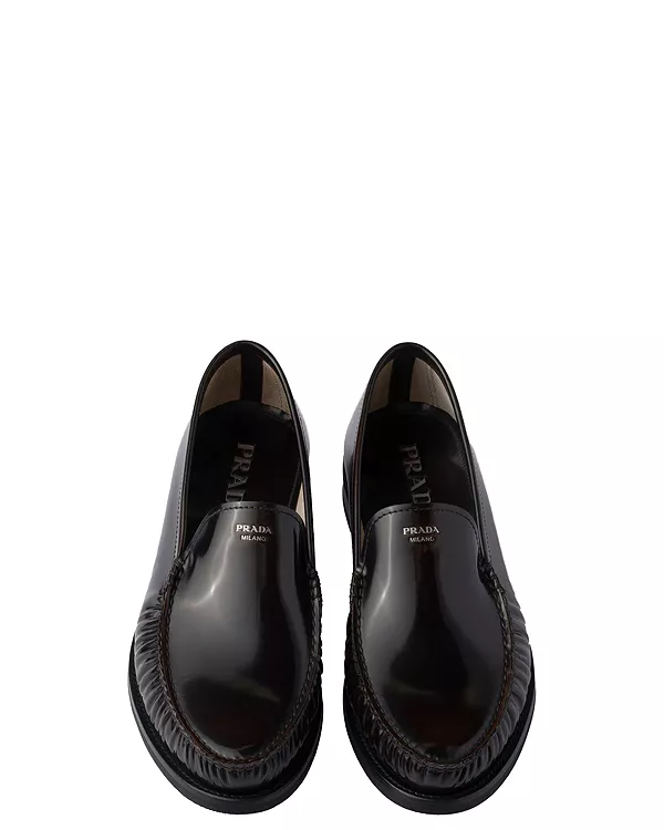 

Мужские лоферы из матовой кожи Prada, черный