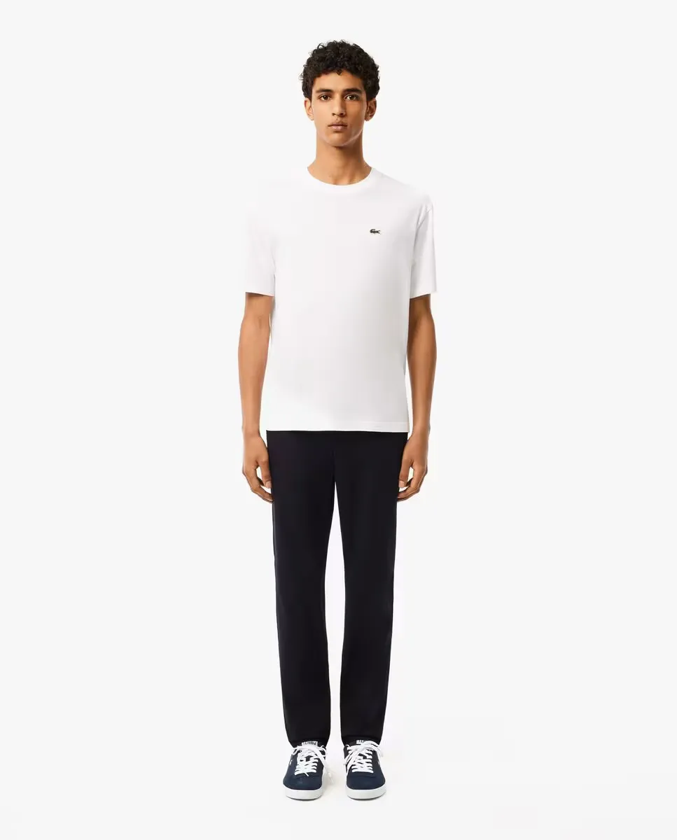 

Мужские брюки-чиносы узкого кроя из хлопка стрейч Lacoste, темно-синий