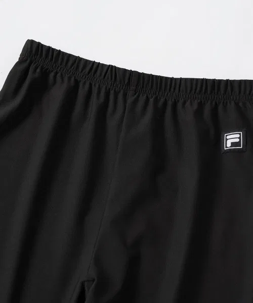 Детские леггинсы FILA из стрейчевой ткани, фиолетовые — фото 3