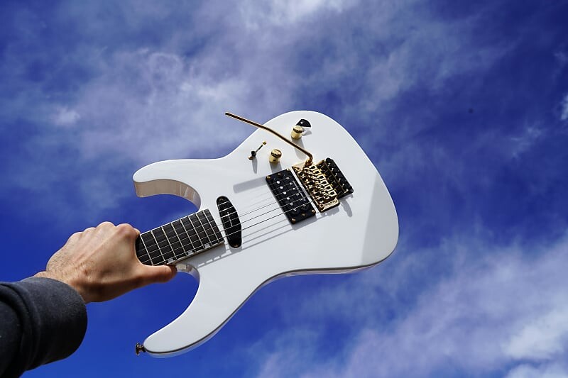 

Электрогитара ESP LTD LTD Mirage Deluxe '87 - Snow White 6- String Electric Guitar