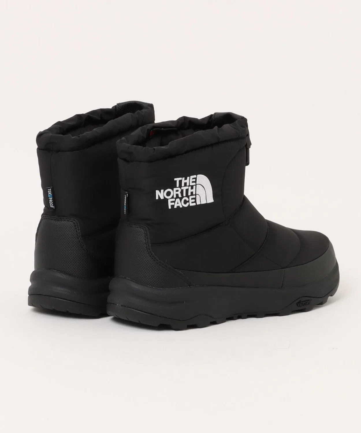 Ботинки зимние The North Face NUPTSE BOOTIE WP LOGO SHORT ARCTIC GRIP, чёрный/белый — фото 2