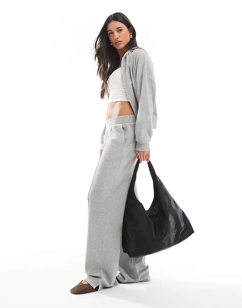 

Спортивные брюки вафельной вязки ASOS DESIGN цвета «меланжевый серый» — часть комплекта