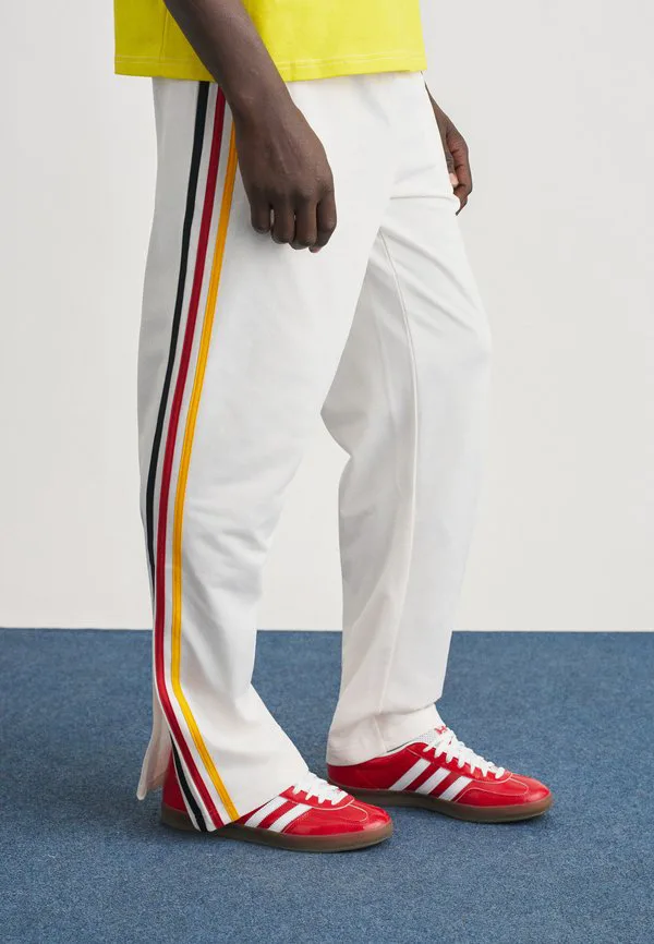 Спортивные штаны firebird Adidas Originals, Clowhi/Gold-Coloured/Powred