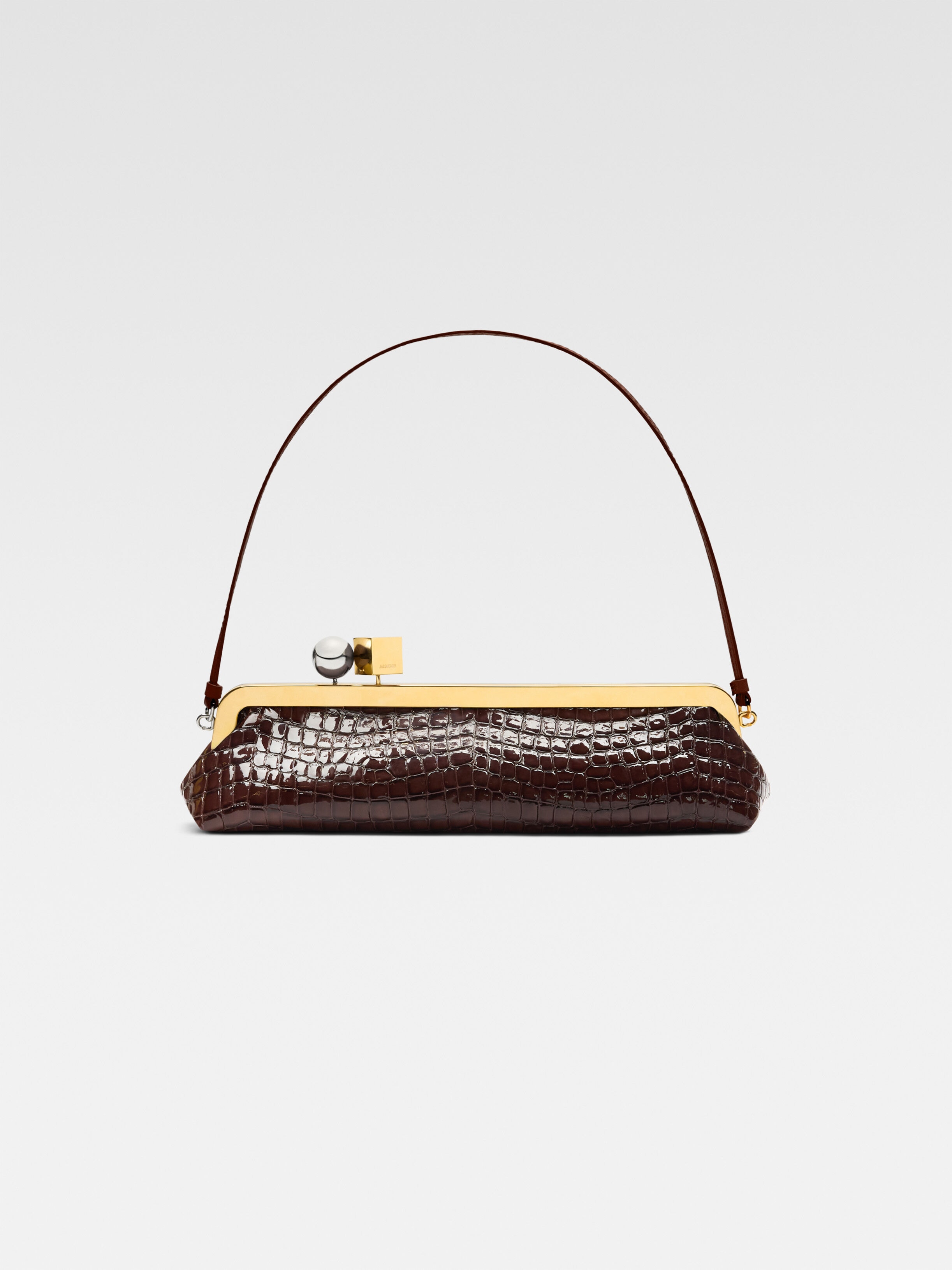 

Сумка с длинной застежкой JACQUEMUS The Salon clutch, коричневый