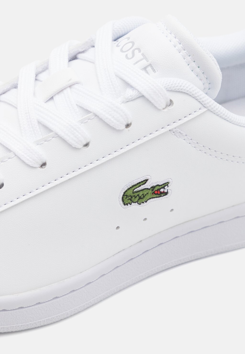 

Кроссовки на шнуровке CARNABY SET JUNIOR CORE ESSENTIALS UNISEX Lacoste, белый