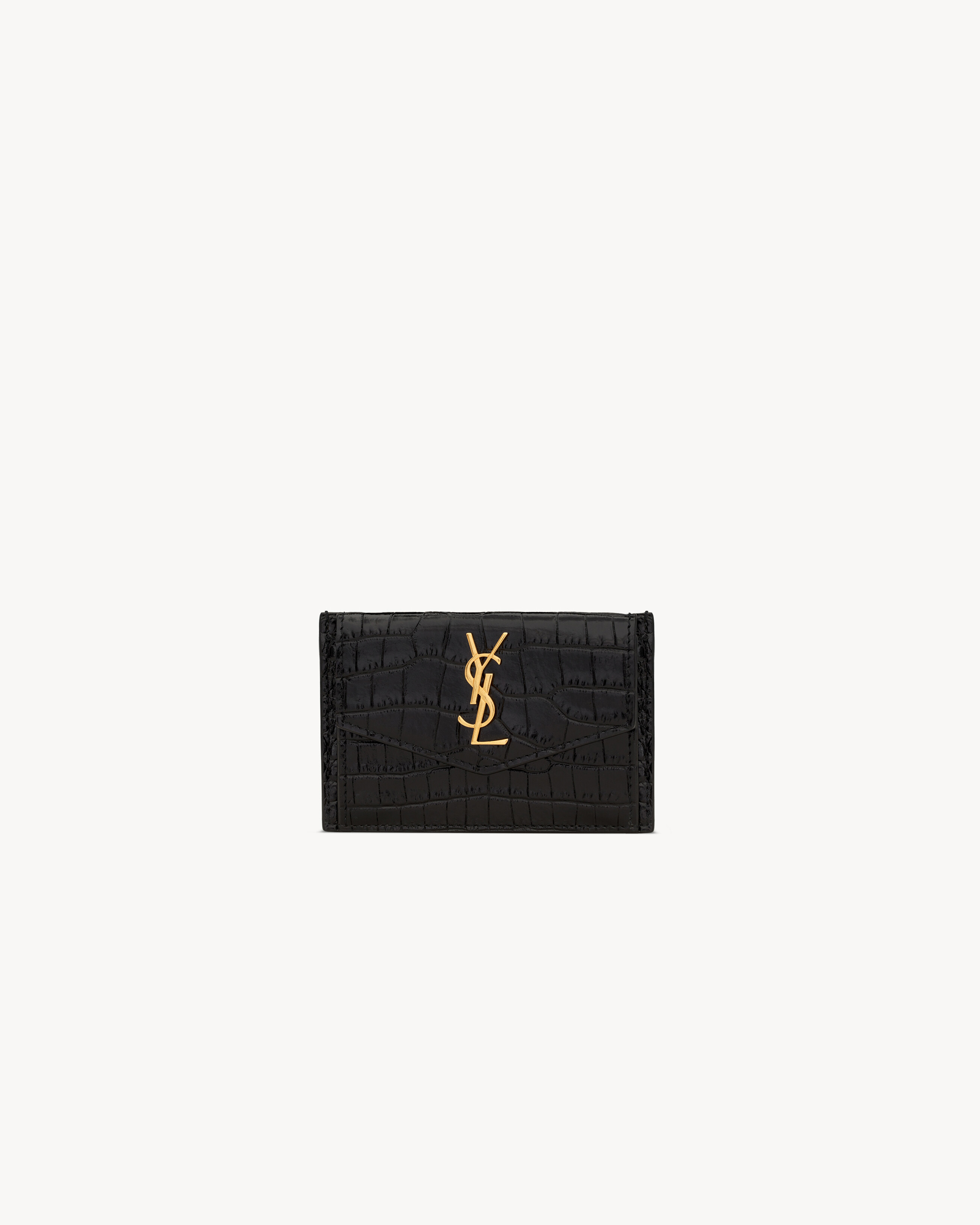 

Визитница UPTOWN FLAP из лакированной кожи с тиснением под крокодила Saint Laurent, черный