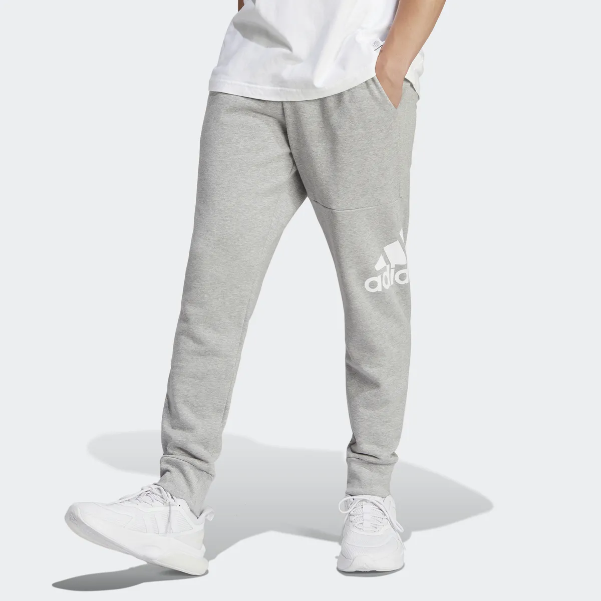 

Adidas Sportswear спортивные брюки "ESSENTIALS FRENCH TERRY TAPERED CUFF LOGO PANTS" (1 шт.), серый
