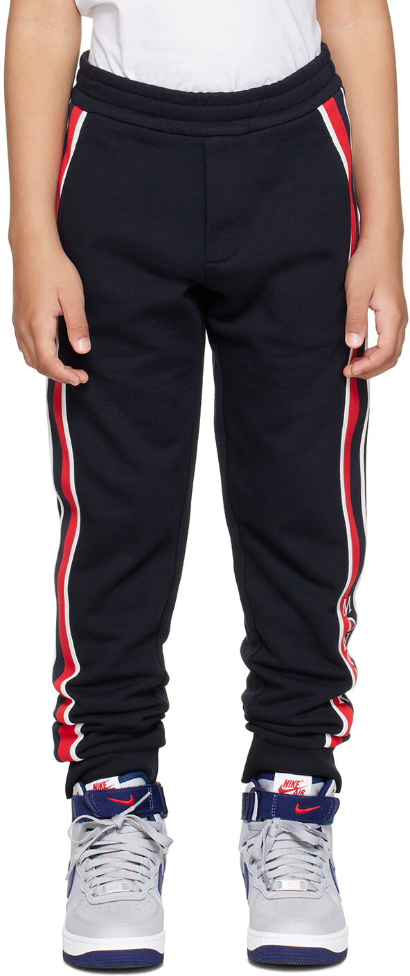 

Moncler Enfant Детские спортивные штаны в темно-синюю полоску