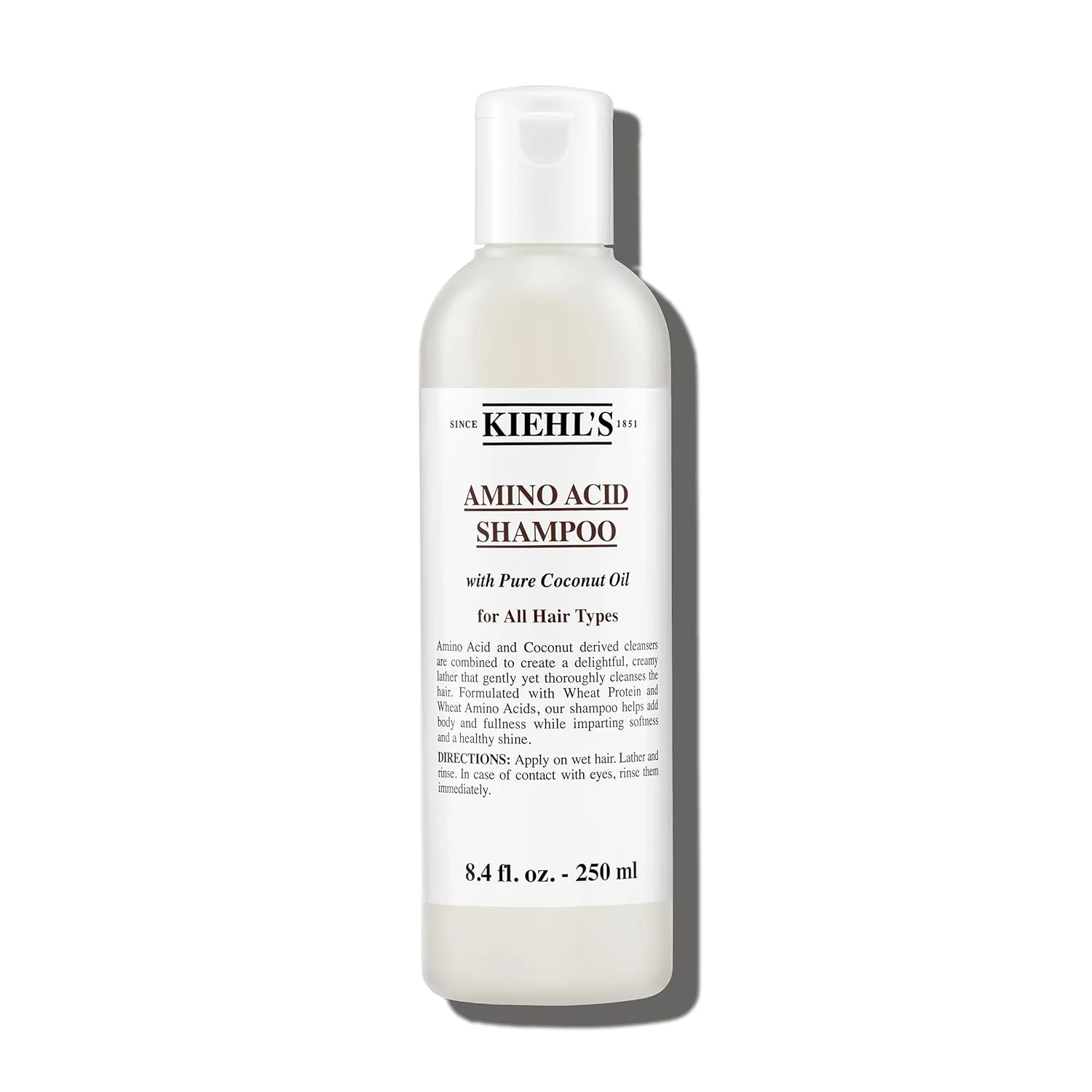Шампунь Kiehl's с аминокислотами и кокосовым маслом очищает и укрепляет волосы, предотвращает ломкость, не снижая уровня увлажнения. Подходит для всех типов волос. Не содержит парабенов. 248 мл / 250 мл