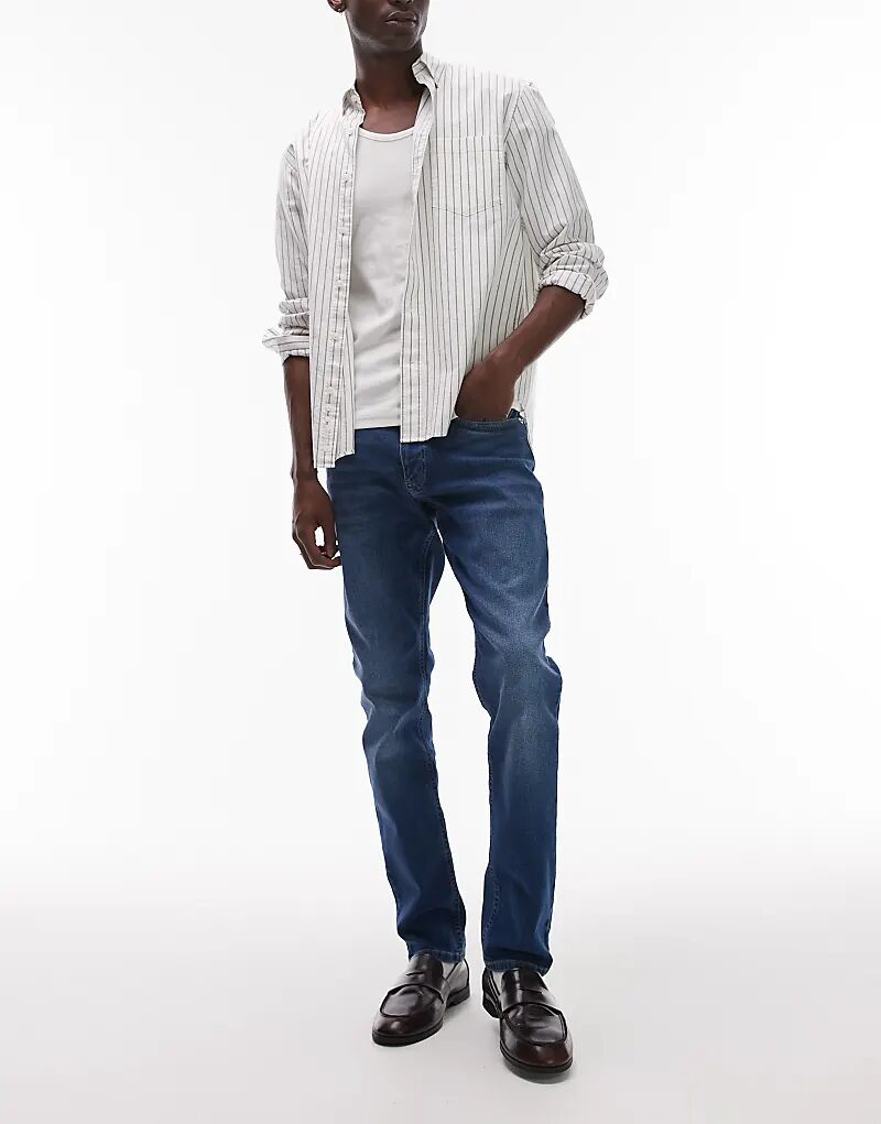 

Узкие джинсы Tommy Jeans Scanton темно-синего цвета