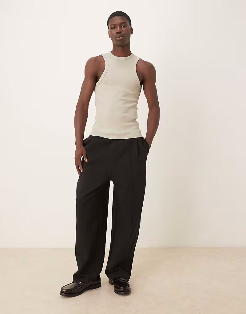 

Спортивные брюки-баллоны ASOS DESIGN свободного кроя, черные
